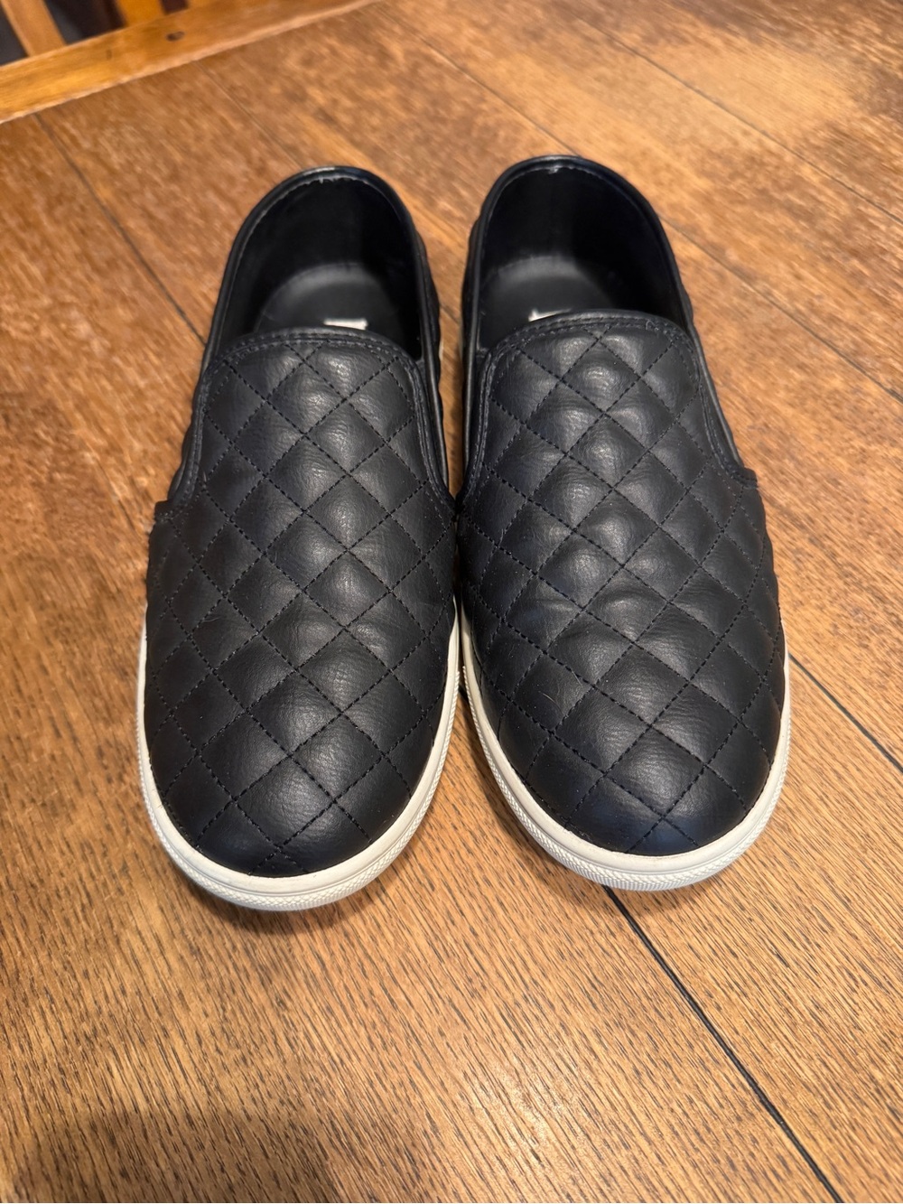 Steve Madden Black Quilted Slip-On Sneakers with White Sole